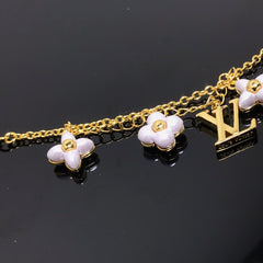 LV LOGO 6 MOTIF STAR AND SUN GOLD BRACELET