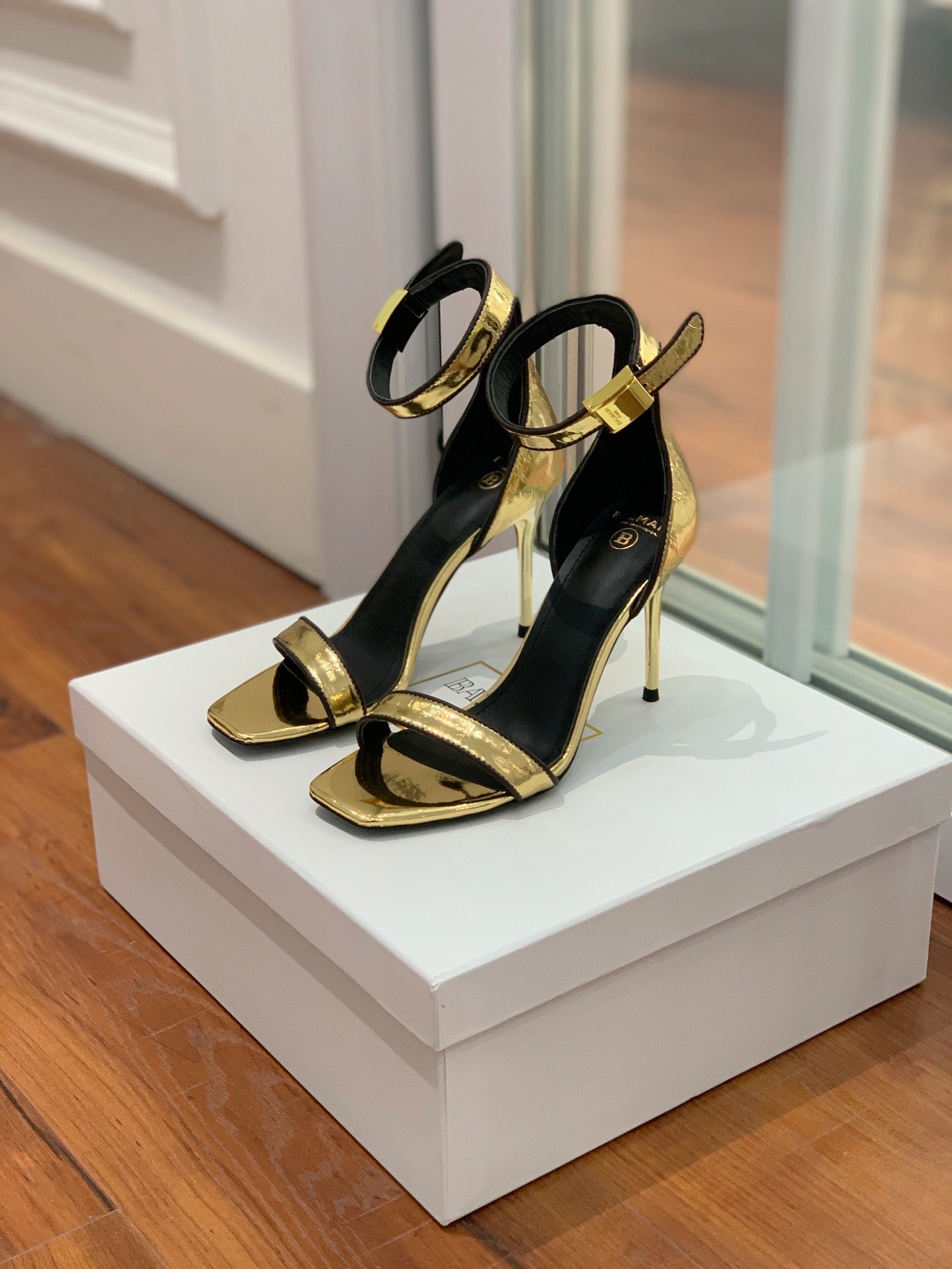 BALMAIN 25S UMA HEELED SANDALS 105MM IN GOLD CALFSKIN