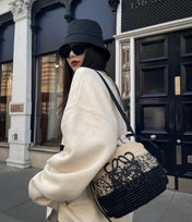 LOE 18 ANAGRAM BASKET BAG IN BLACK AND NATURAL RAFFIA
