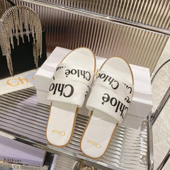WOODY SLIPPER IN WHITE MIX BLACK CANVAS
