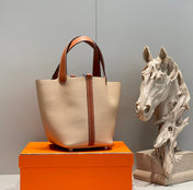 HERMES 25S PICOTIN LOCK 18 IN BURNT ORANGE AND LIGHT BROWN CALFSKIN SILVER HARDWARE
