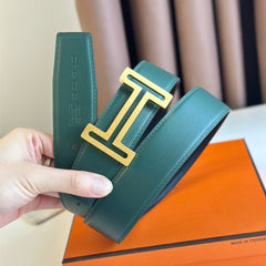 HM  BELT BUCKLE & REVERSIBLE TEAL GREEN AND BLACK LEATHER STRAP 38MM GOLD HARDWARE