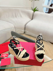 GARAVANI ROCKSTUD WEDGE SANDALS IN BLACK CALFSKIN AND BEIGE RAFFIA