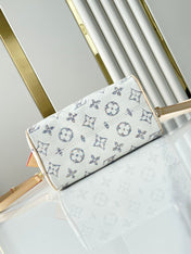 SPEEDY BANDOULIÈRE 20 IN WHITE MONOGRAM JACQUARD FABRIC AND BEIGE CALFSKIN TRIM