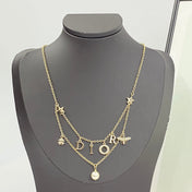 CD 26S MULTI CHARM LAYERED DIOR NECKLACE WITH PEARL DROP IN GOLD TONE 631779