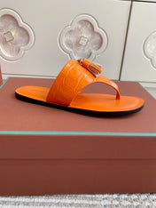 FLIP FLOPS IN ORANGE LAMBSKIN SNAKE EMBOSSING