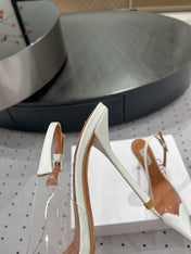 ALAIA HIGH 9 CM SLINGBACK IN WHITE PATENT CALFSKIN AND FILM