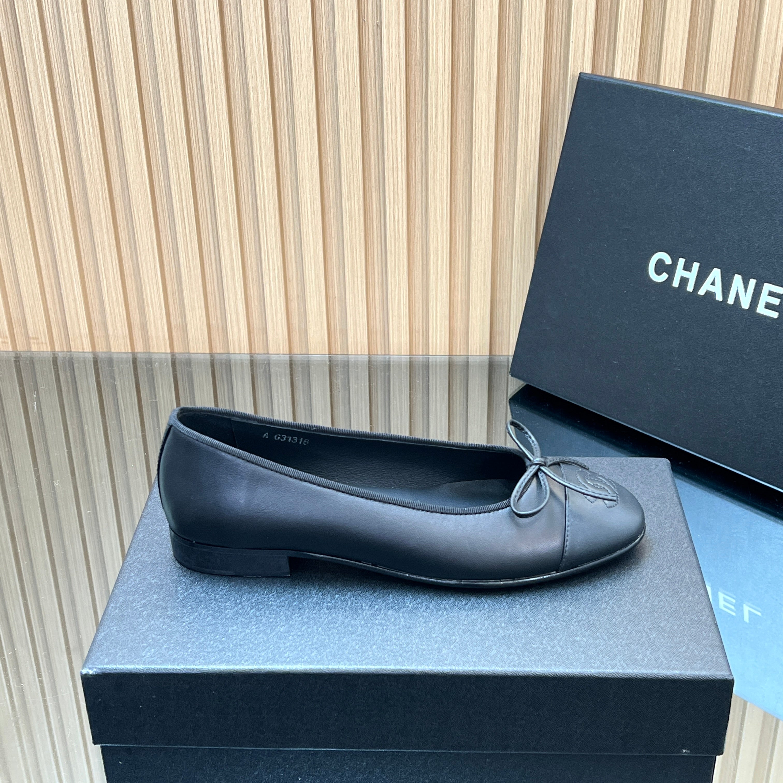 CHANEL 25S BALLET FLATS 20MM IN BLACK CALFSKIN WITH BOW