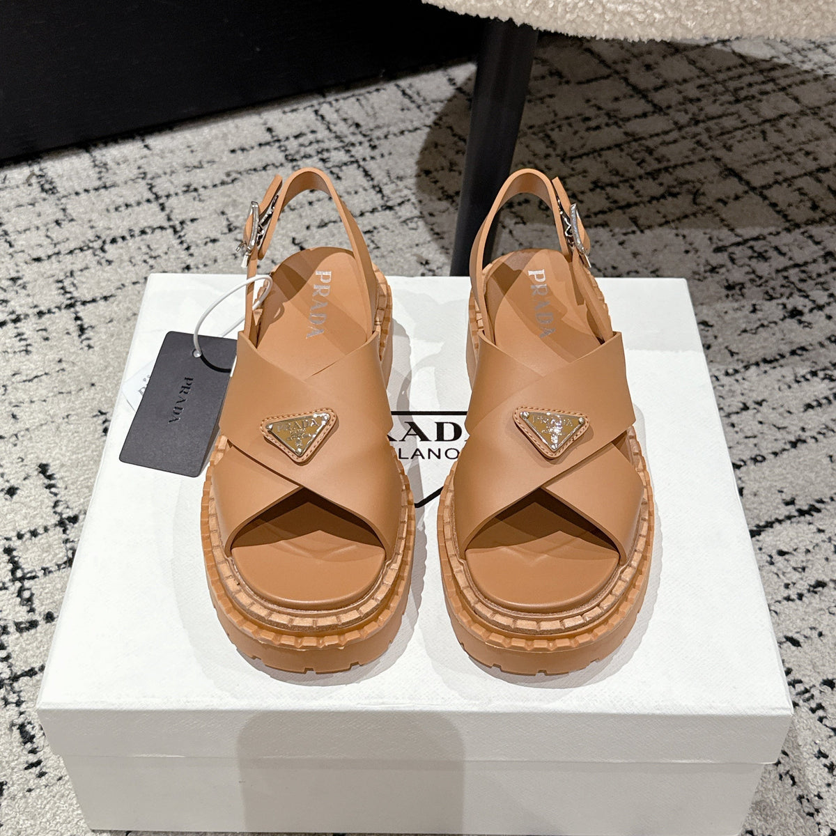 PRADA 25S CRISSCROSS SANDALS IN BURNT ORANGE CALFSKIN LOGO