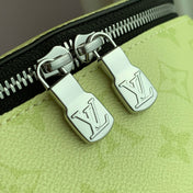 DISCOVERY SLIM BACKPACK 38 IN LEMON YELLOW MONOGRAM ECLIPSE REVERSE CALFSKIN