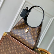 THE DROP PM 28 IN BROWN MONOGRAM COATED CANVAS AND CALFSKIN
