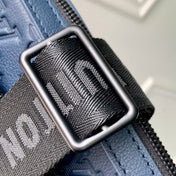 TRIO MESSENGER 25 IN BLUE MONOGRAM SHADOW CALFSKIN