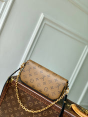WALLET ON CHAIN IVY 23 IN BROWN MONOGRAM REVERSE CANVAS