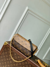 WALLET ON CHAIN IVY 23 IN BROWN MONOGRAM REVERSE CANVAS