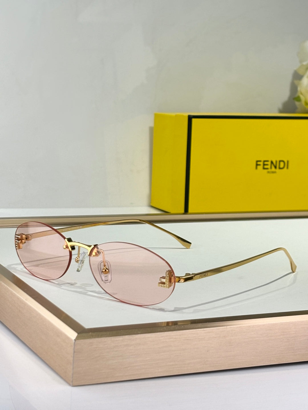 FIRST CRYSTAL RIMLESS OVAL FRAME SUNGLASSES FE4075US IN METAL