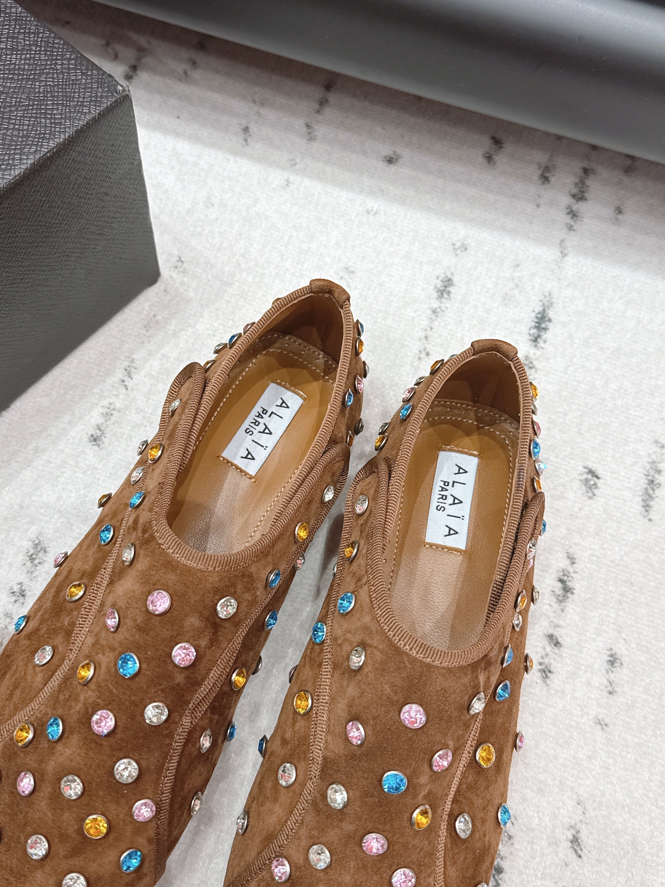 ALAIA 26S EMBELLISHED FLATS IN LIGHT BROWN SUEDE