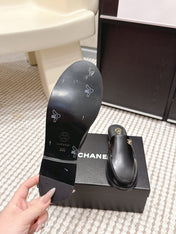 CHANEL 26S LOAFER MULES IN BLACK CALFSKIN