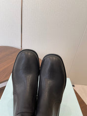 PRADA 25S COWBOY BOOTS IN DARK BLACK-BROWN CALFSKIN