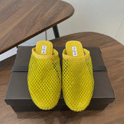 ALAIA 26S FLAT MULES IN DARK YELLOW SUEDE AND MESH RHINESTONE-EMBELLISHED