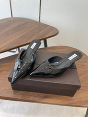 ALAIA 26S HEELED MULES 50 MM IN BLACK GLOSSY CALFSKIN