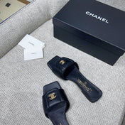 CHANEL 26S FLAT SLIDES IN BLACK LAMBSKIN