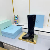 PRADA 25S CHUNKY SOLE TALL BOOTS MARTIN 50MM IN BLACK GLOSSY CALFSKIN