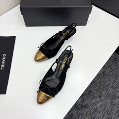 CC SLINGBACK 25S IN BLACK SUEDE AND GOLDEN BROWN LAMBSKIN WITH BOW
