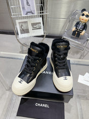 MARTIN BOOTS IN BLACK CALFSKIN AND LAMB FUR LINING