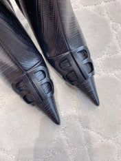 POINTED-TOE HIGH HEEL BOOTS IN BLACK LIZARD EMBOSSED CALFSKIN