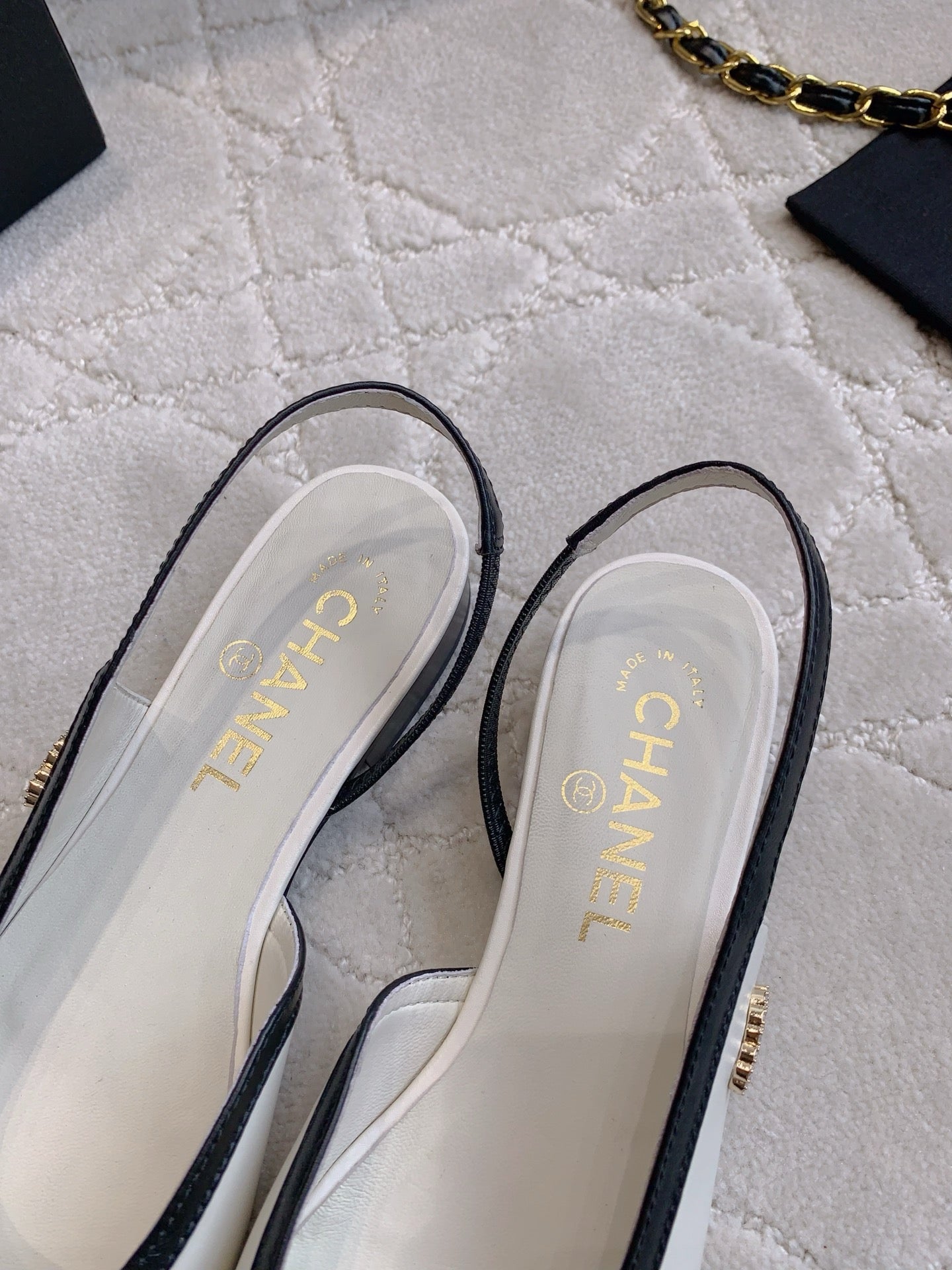 CHANEL 25S SLINGBACK IN BLACK AND WHITE CALFSKIN GOLD HARDWARE