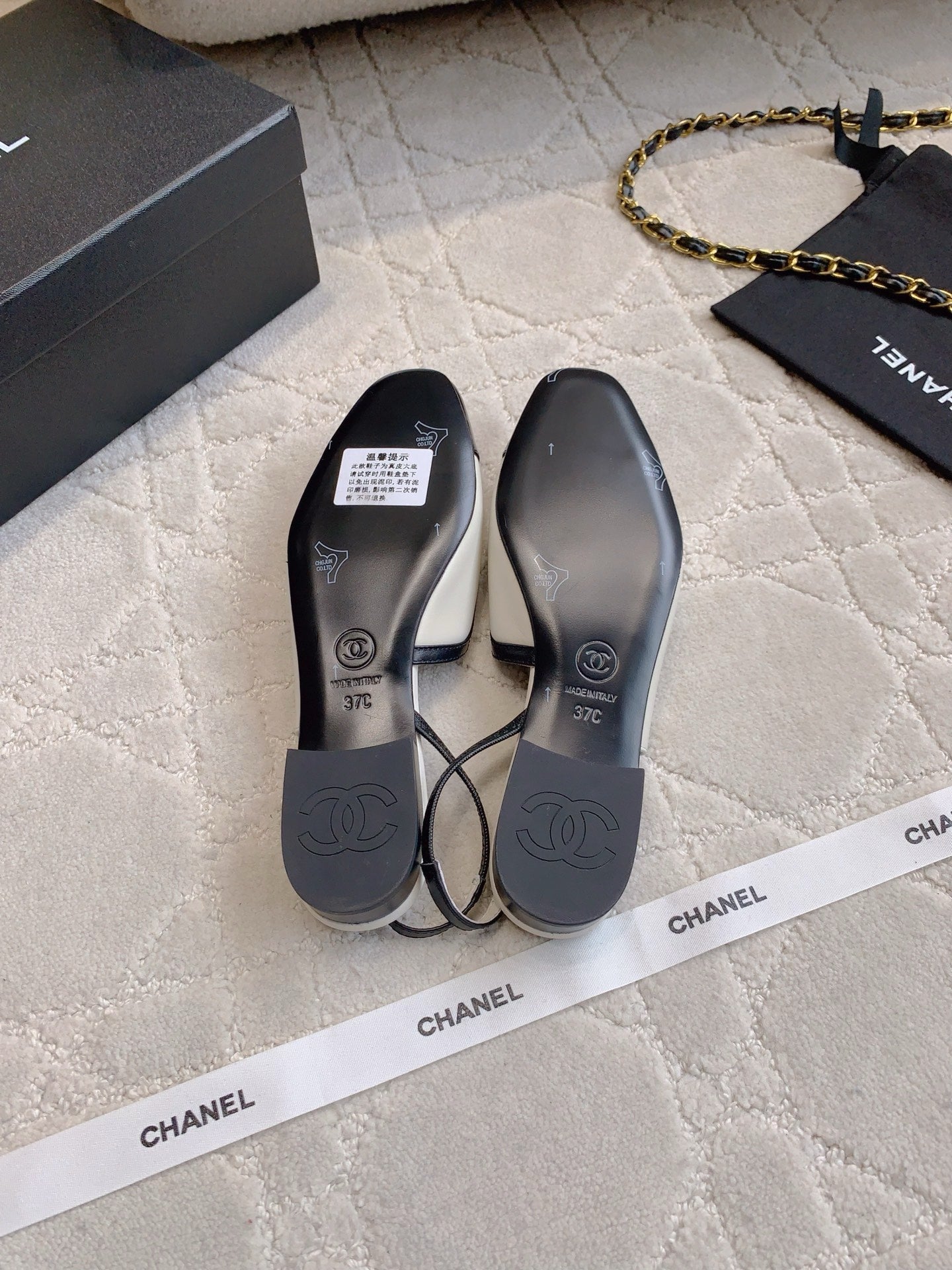 CHANEL 25S SLINGBACK IN BLACK AND WHITE CALFSKIN GOLD HARDWARE