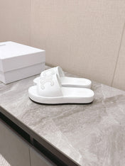 THICK-SOLED SLIDES IN WHITE SMOOTH LAMBSKIN LOGO WITH CRYSTALS