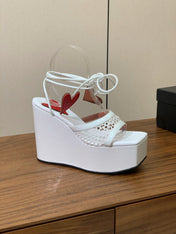 ALAIA BANQUET WEDGE SANDALS IN WHITE LAMBSKIN WITH RED HEART