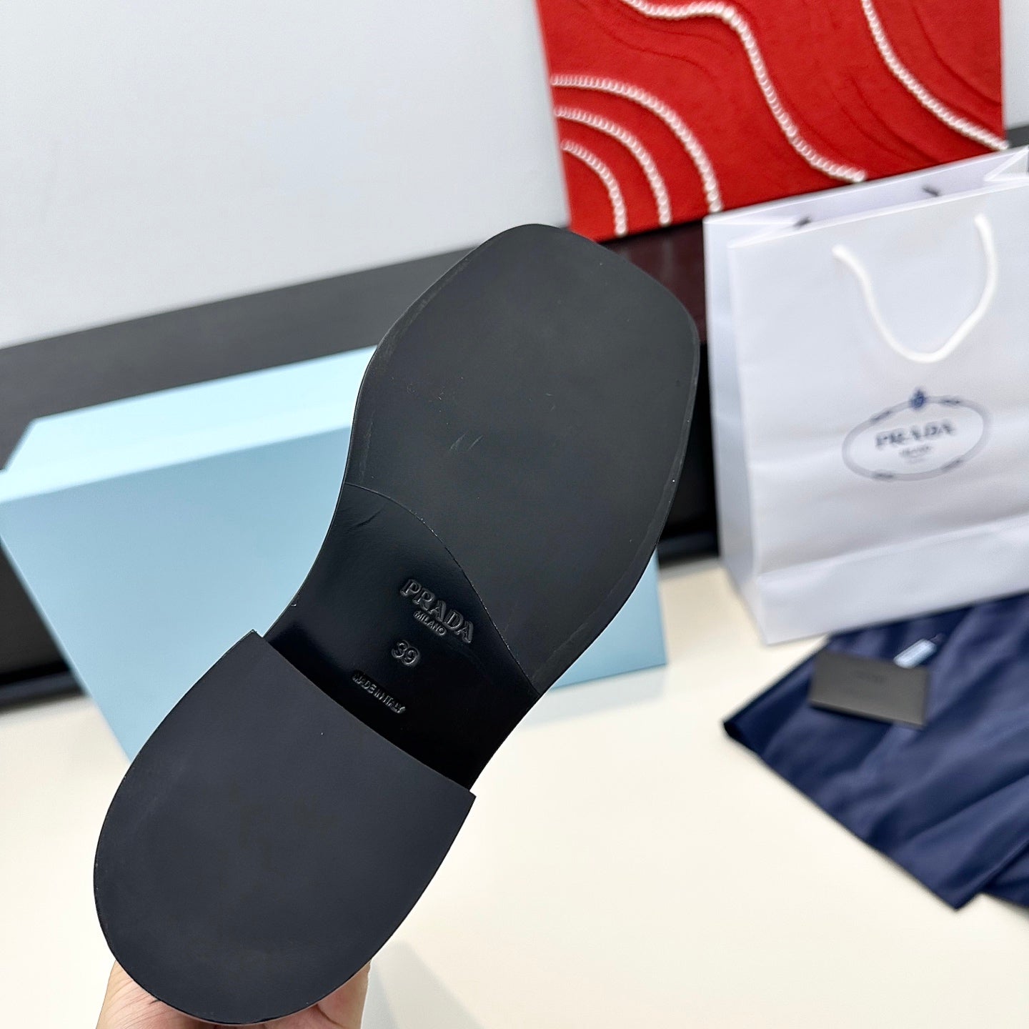 PRADA 25S SQUARE-TOE HIGH-CUT BOOTS IN BLACK CALFSKIN