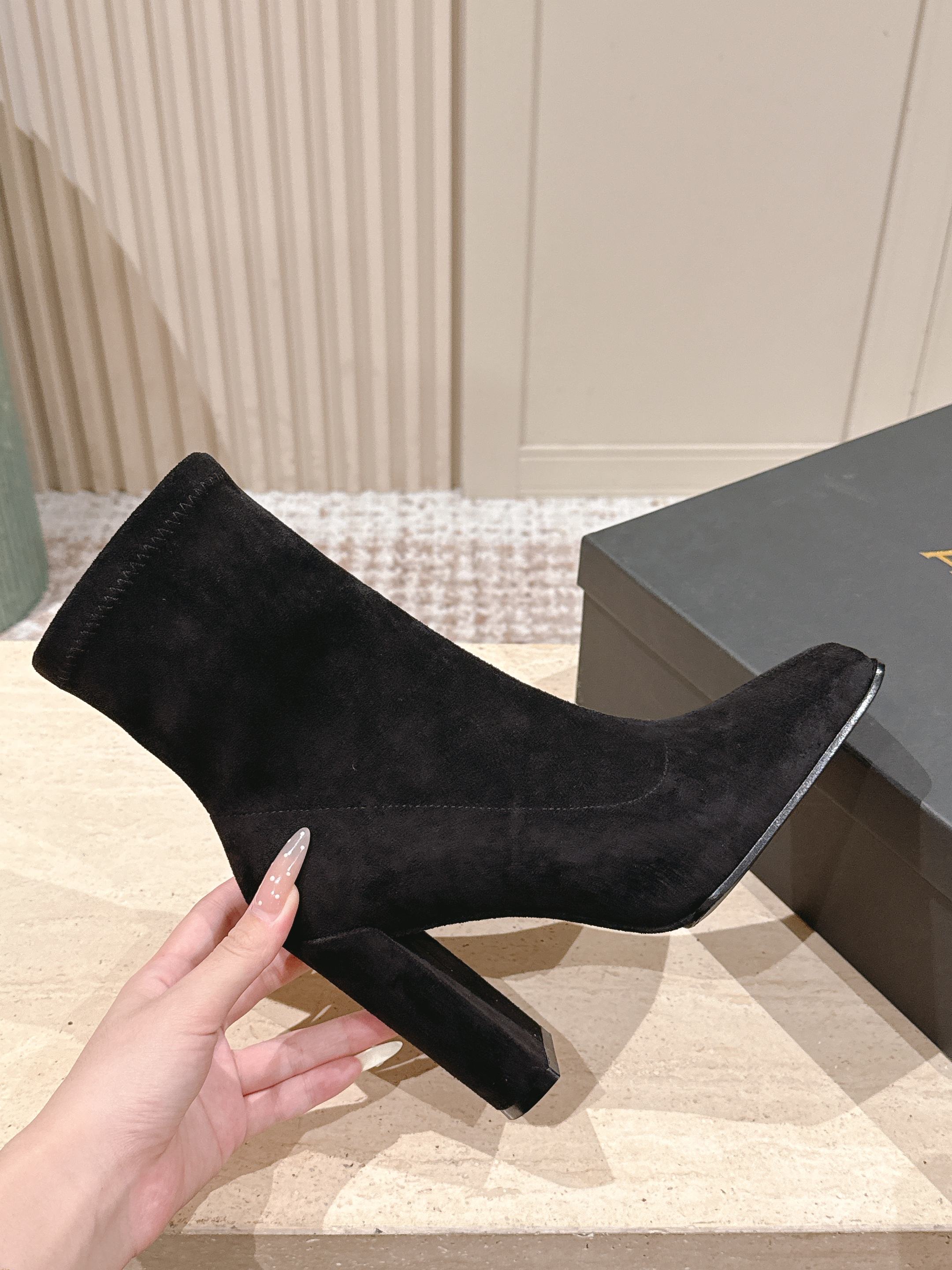 ALAIA 26S HEELED BOOTS 90 MM IN BLACK SUEDE