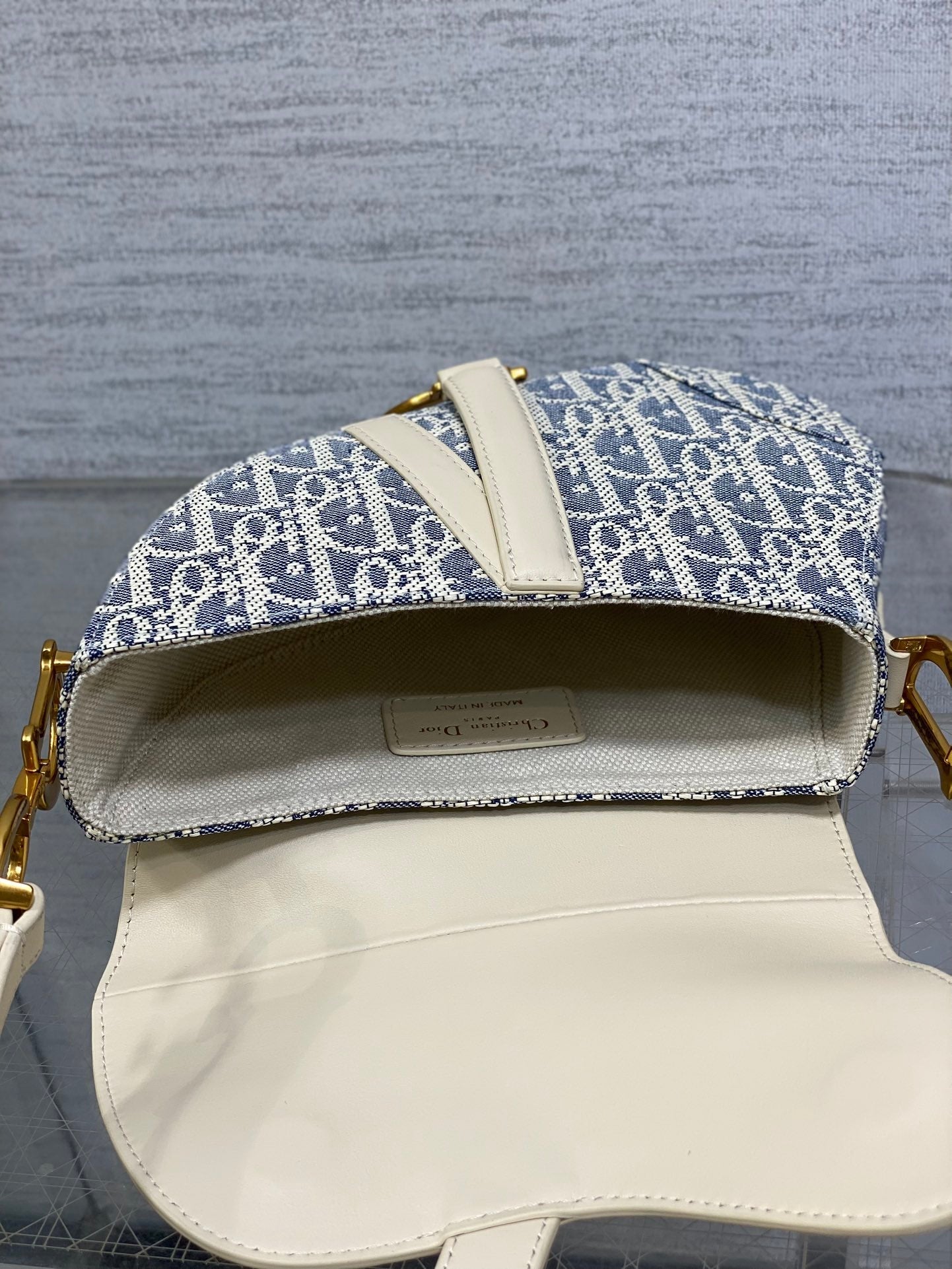 DIOR 25S MINI SOFT SADDLE BAG 19 IN BLUE DIOR OBLIQUE CHAMBRAY AND IVORY SMOOTH CALFSKIN