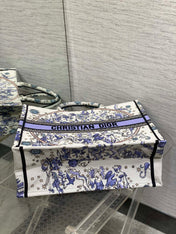 DIOR 25S LARGE BOOK TOTE 42 IN WHITE AND PURPLE DIOR NIGHT OF DREAMS EMBROIDERY