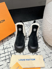 RUBY FLAT ANKLE BOOT IN BLACK SUEDE WITH WHITE SHEARLING