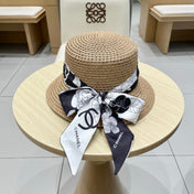 NATURAL STRAW BUCKET HAT WITH RIBBON 672771