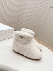 SNOW ANKLE BOOTS IN WHITE SHEARLING
