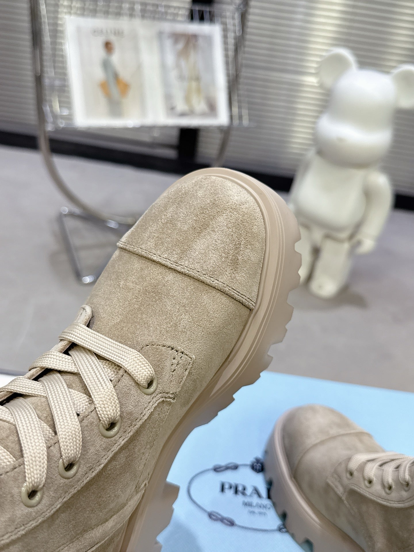 PRADA 25S WARRIOR BOOTS IN BEIGE SUEDE