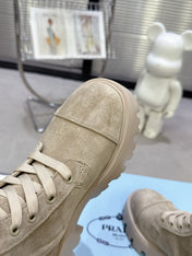 PRADA 25S WARRIOR BOOTS IN BEIGE SUEDE