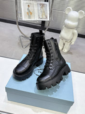 PRADA 25S WARRIOR BOOTS IN BLACK CALFSKIN
