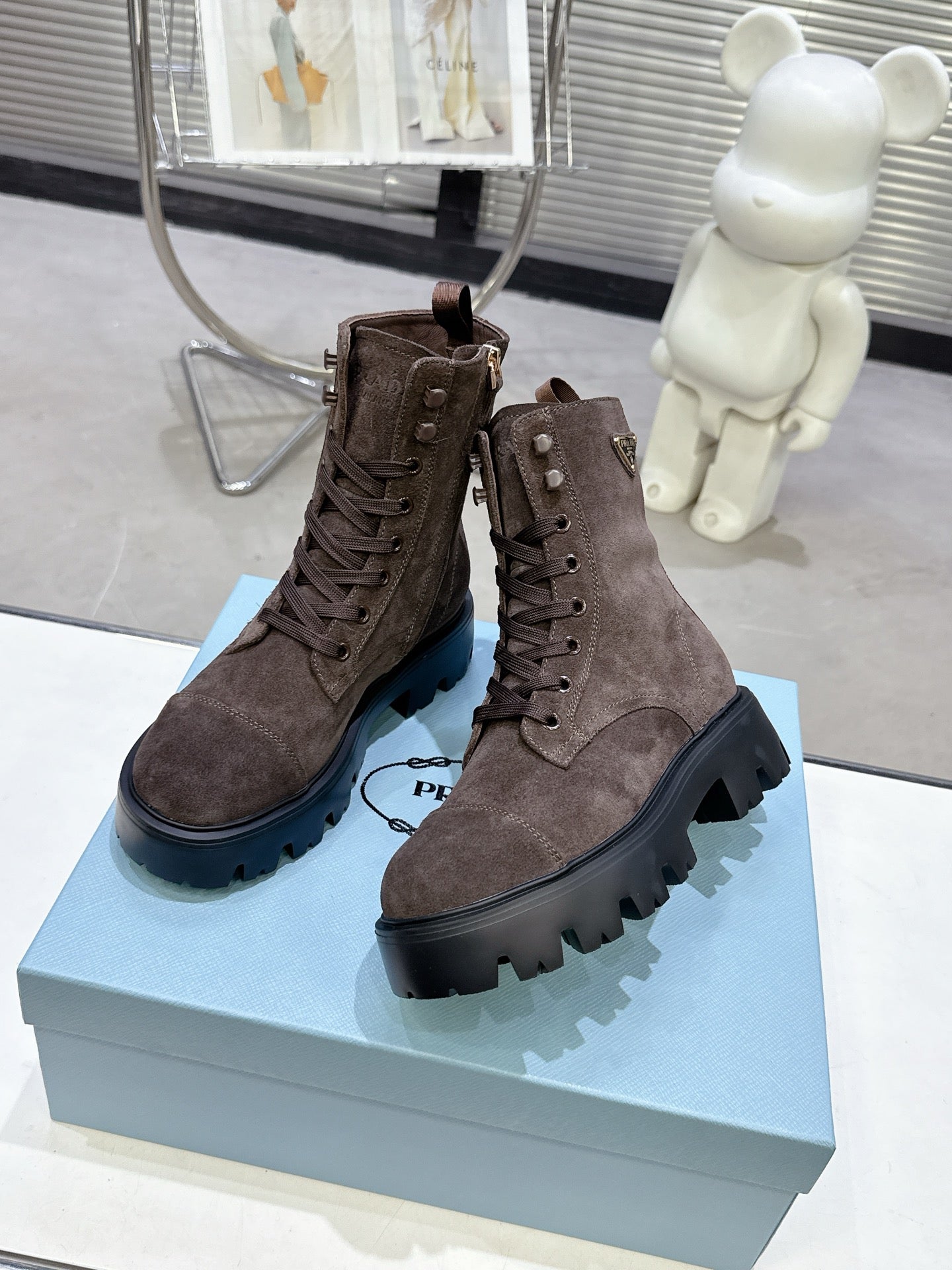 PRADA 25S WARRIOR BOOTS IN DARK BROWN SUEDE