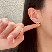 DOUBLE C STUD EARRINGS IN GOLD METAL FULLY DIAMOND