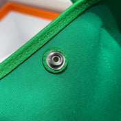 GARDEN PARTY 30CM IN CADMIUM GREEN TOILETS COTTON CANVAS AND GREEN CALFSKIN