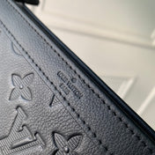 POCHETTE VOYAGE 22 IN BLACK MONOGRAM SHADOW CALFSKIN