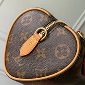 NANO SPEEDY DATING 18 IN BROWN COATED CANVAS GOLD HARDWARE