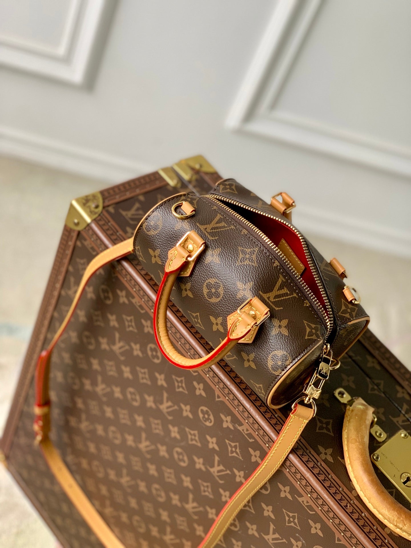 NANO SPEEDY DATING 18 IN BROWN COATED CANVAS GOLD HARDWARE