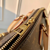 BOÉTIE PM TOTE 31.5 IN BROWN MONOGRAM COATED CANVAS AND CALFSKIN